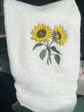 White hand towel with sunflowers
