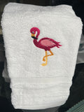 White hand towel with flamingo