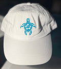 White ball cap with turtle
