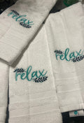 White hand towel with Relax