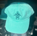 Teal ball cap with turtle