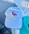 White ball cap with flamingo