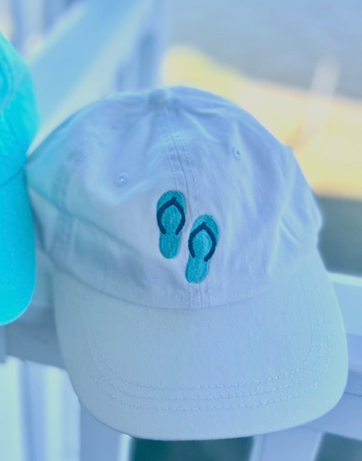 White ball cap with flip flops
